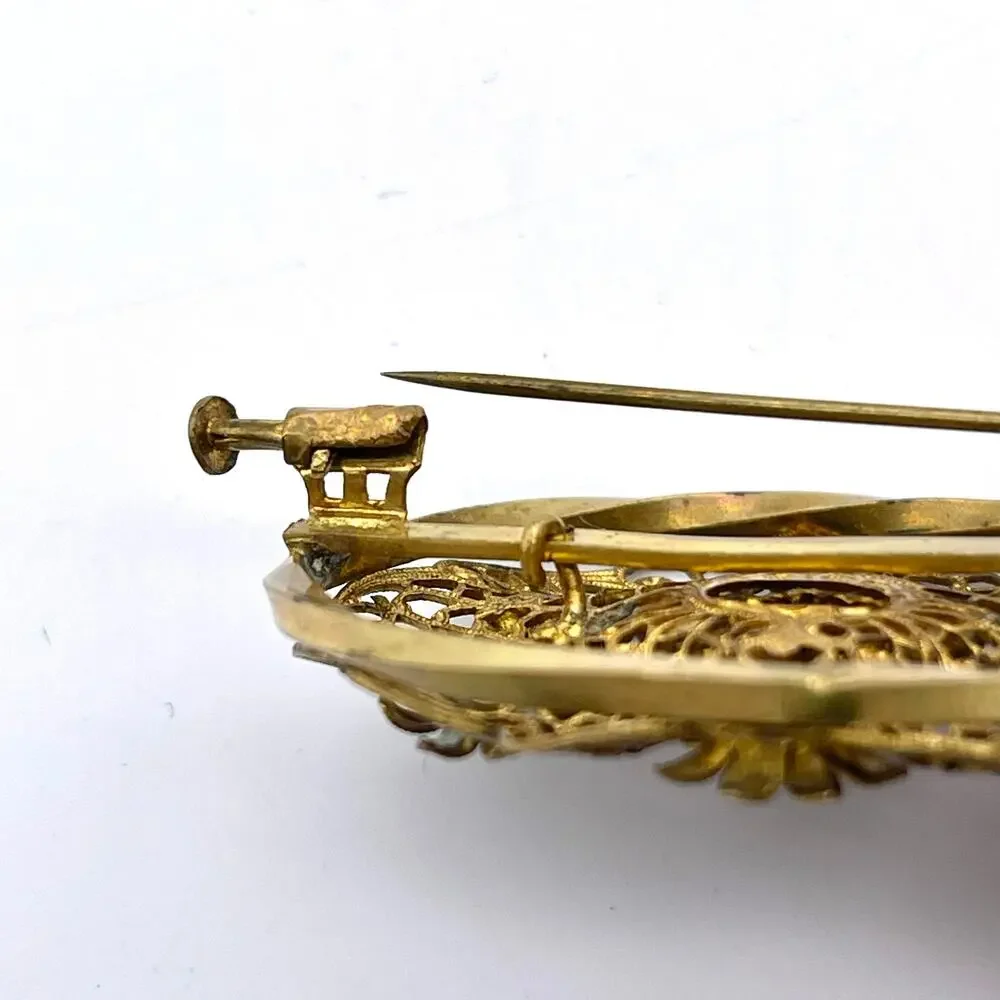 Antique Brass Filigree Brooch with Amethyst-Colored Stones | Trombone Clasp Pin